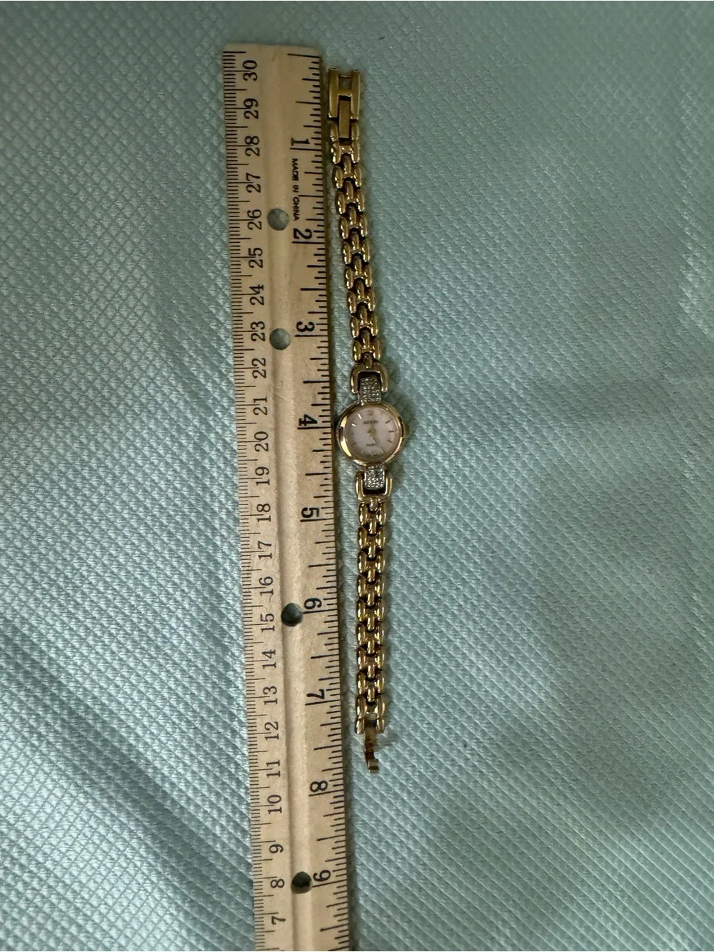 Adolfo Gold Tone Crystal Accent Women's Watch with Mother-of-Pearl Dial Works!